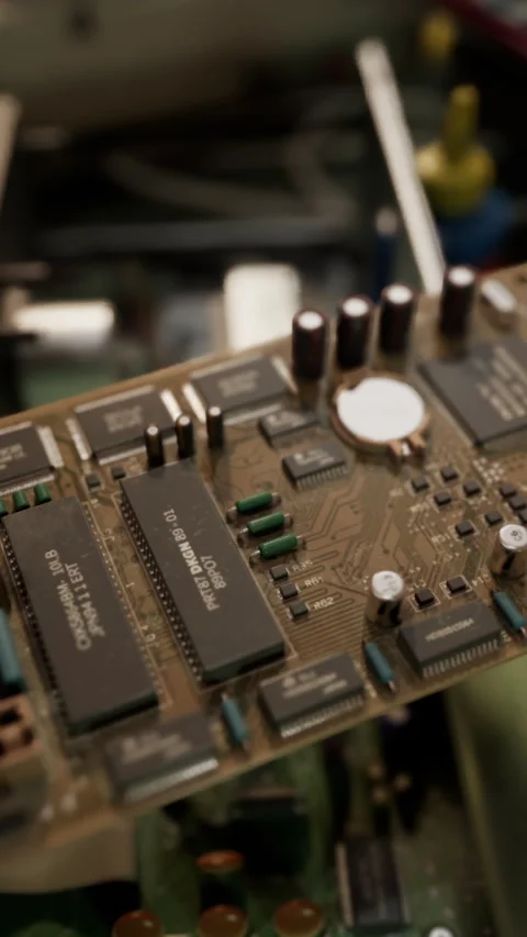 Old computer floppy disk and motherboard Stock Footage 303897576