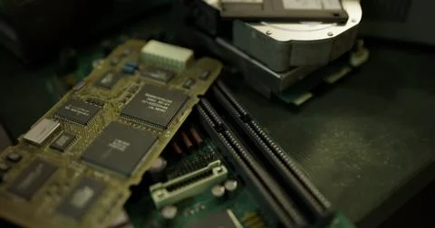 Old computer parts show complex circuits and hardware layouts Stock Illustration