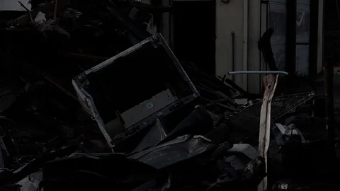An old computer in a pile of trash Stock Footage 95109068