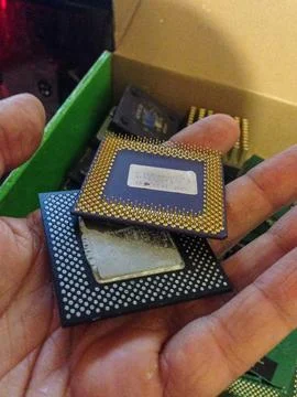 Old Computer Processors Held in Hand Stock Photos