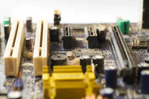 Old computer system unit with spiderweb and dust inside. Stock Photos