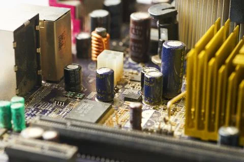 Old computer system unit with spiderweb and dust inside. Stock Photos