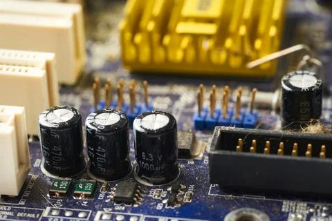 Old computer system unit with spiderweb and dust inside. Stock Photos