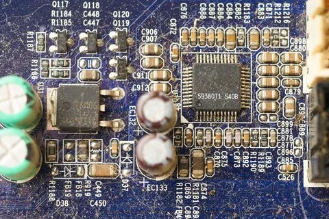 Old computer system unit with spiderweb and dust inside. Stock Photos