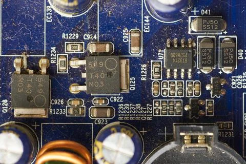 Old computer system unit with spiderweb and dust inside. Stock Photos