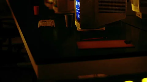 Old computers in a dimly lit room during the night Stock Footage 344971389