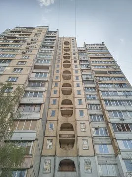Old concrete panel multi-storey highrise residential building. Stock Photos