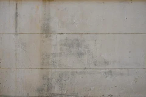 Old concrete wall with horizontal line and tiny vertical long crack surface Stock Photos