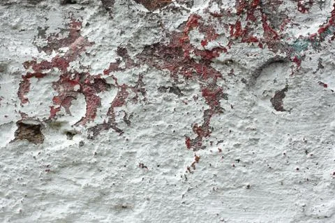 Old concrete wall with multi-layer shelled surface Stock Photos