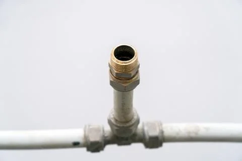 Old connection fitting tee on plastic pipes Stock-Fotos