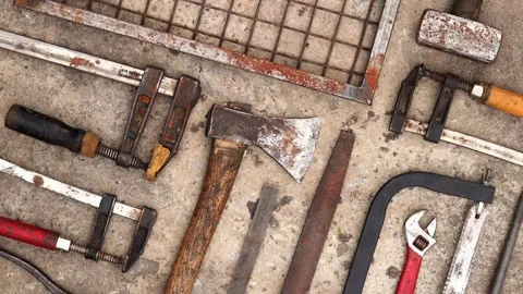 Old construction tools laid out on a concrete background, top view Stock Footage 279938411