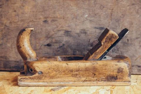 Old construction tools on a wooden workbench flat lay background with copy sp Stock Photos