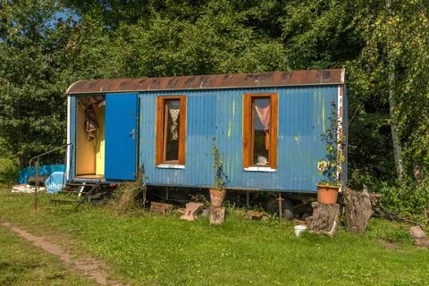 Old construction trailer converted into a caravan Stock Photos