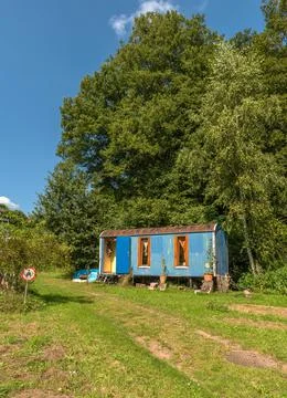 Old construction trailer converted into a caravan Stock Photos