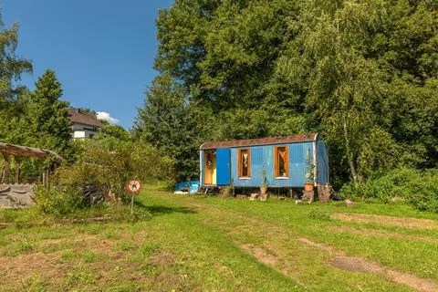 Old construction trailer converted into a caravan Stock Photos