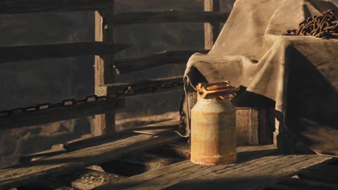 Old container on wooden platform in a rustic setting Stock Footage 344099608