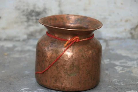 Old copper jug. Stock Photos