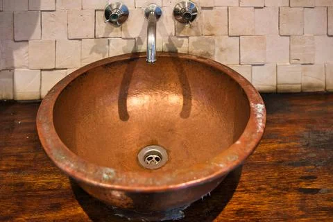 Old copper sink Stock Photos