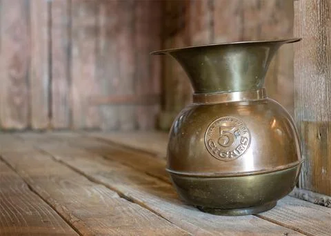 Old copper spittoon Stock Photos