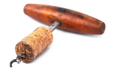 Old corkscrew and cork Stock Photos