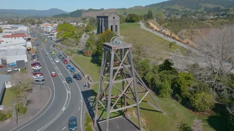 Old cornish Pumphouse and mining poppet in waihi, New Zealand Stock Footage 252312484