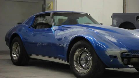 Old Corvette in Getting restored in a body shop Stock Footage 32287203