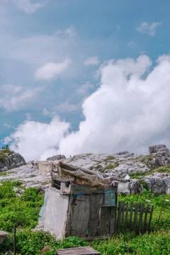 An old cottage ready to fall off high in mount olympus hiking trail on an Stock Photos