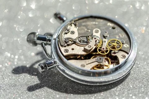 An old countdown timer opened up showing all the details of the mechanism,... Stock Photos