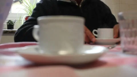 Old couple having coffee together Stock Footage 295550061