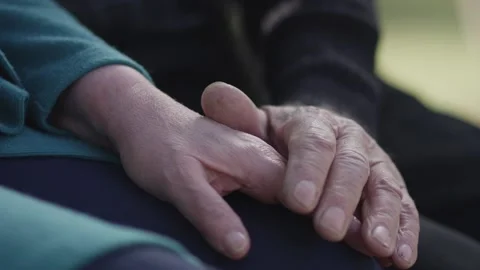 Old Couple Holding Hands. Close Up Of Hands Of Aged Couple Caring Each Other . Stock Footage