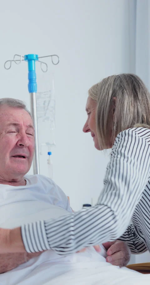 Old couple, hug and support in hospital room, talking or compassion for elderly Stock Footage 340896042