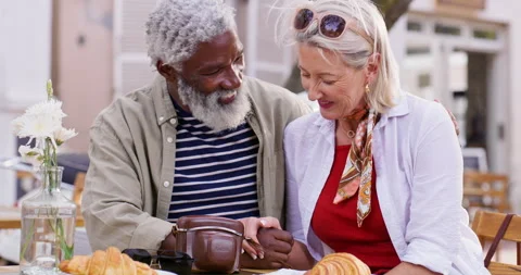 Old couple, interracial and date with love, holding hands and travel in Paris Stock Footage 307757740