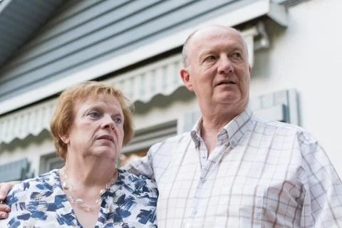 Old couple looking concerned Stock Photos