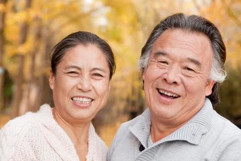Old couple in park Stock Photos