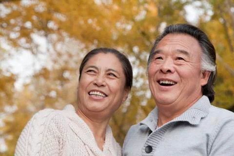 Old couple in park Stock Photos