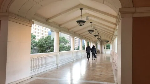 Old Couple Walking Down Empty Hallway (Bellagio, Las Vegas strip) Stock Footage 84014961