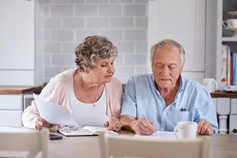 Old couple, writing and document with banking help, mortgage balance or hou.. Stock Photos