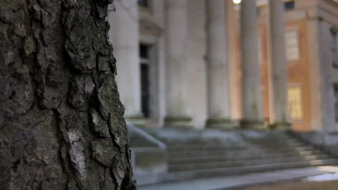 Old courthouse. Pan from behind tree to ... | Stock Video | Pond5