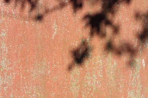 Old cracked red rusty background with shadows Stock Photos