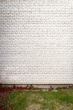 Old cracked white brick wall Stock Photos