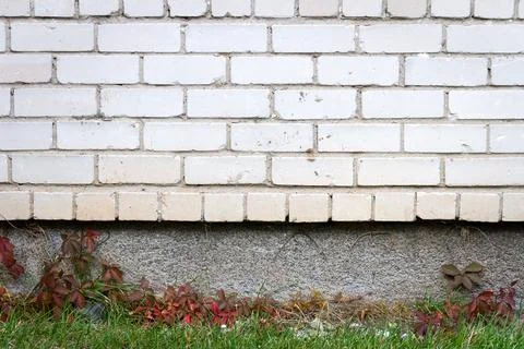 Old cracked white brick wall Stock Photos