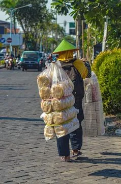 An old cracker seller around in Gresik Stock Photos