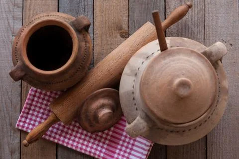 Old crocks with rolling pin Foto stock