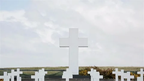 Old Cross shaped Grave stone cemetery Stone crosses on grave in a cemetery a Stock Footage 334646260