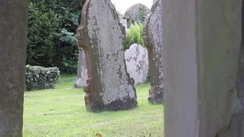 Old Cross shaped Grave stone cemetery Stone crosses on grave in a cemetery a Stock Footage 334646332