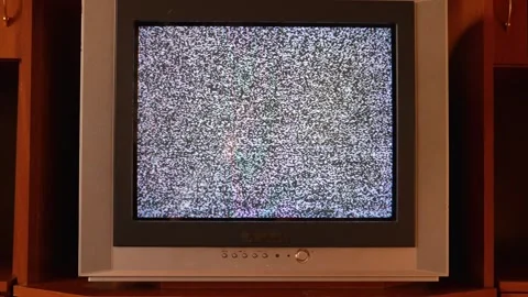 Old CRT television with static screen in wooden cabinet Stock Footage 314634162
