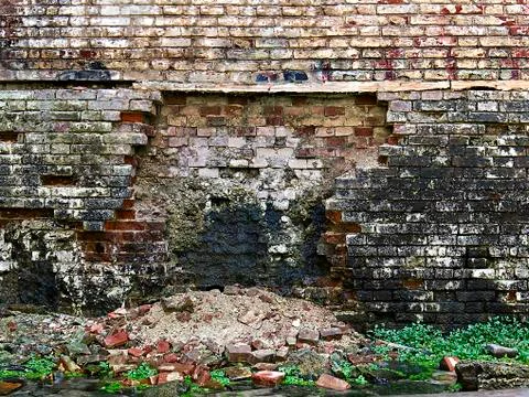 Old crumbling brick wall as background Photos