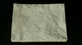 Old crumpled paper animation - stop motion HD Footage