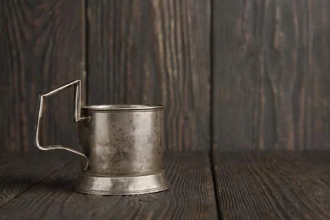 Old cup holder on the table Stock Photos