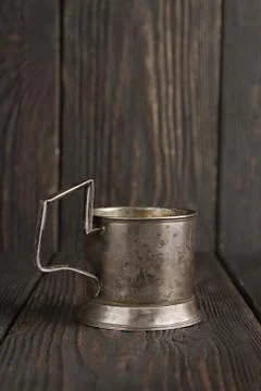 Old cup holder on the table Stock Photos